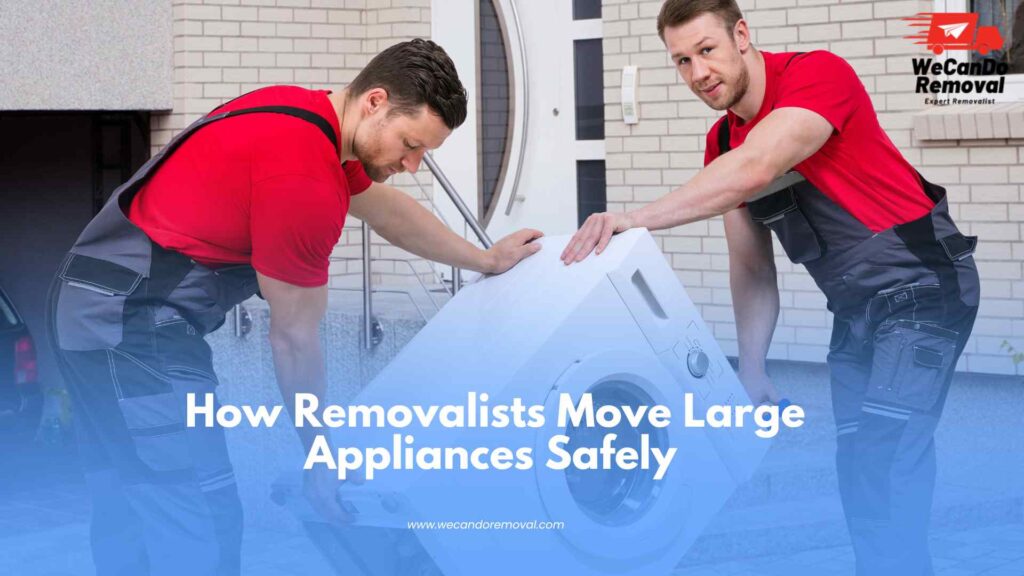 Professional movers safely moving large appliances with protective equipment.